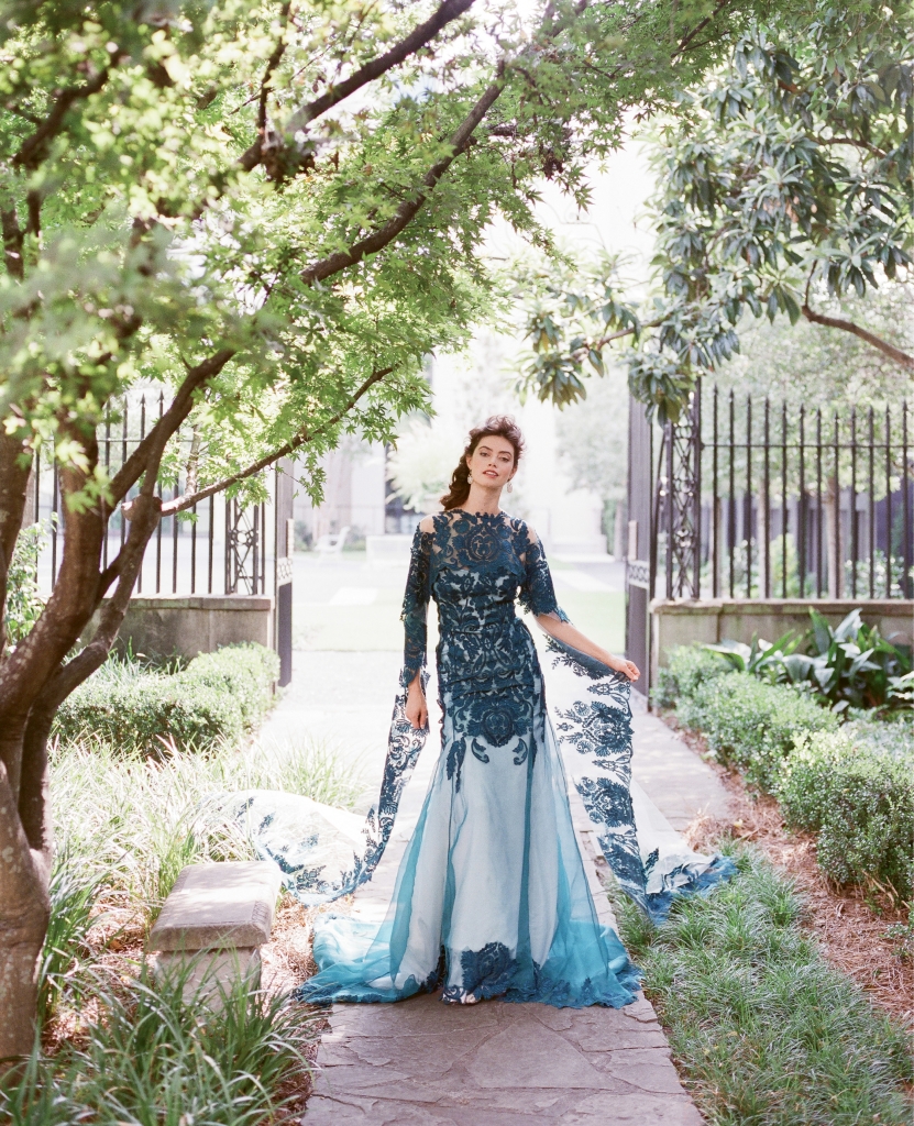 Emily Kotarski’s “Queen Charlotte” silk embroidered cape and gown from Emily Kotarski Bridal Studio. “Grace” topaz and iolite earrings from Peyton William Jewelry. Single Stone’s diamond and gold ring from Croghan’s Jewel Box. (Photo by Corbin Gurkin)