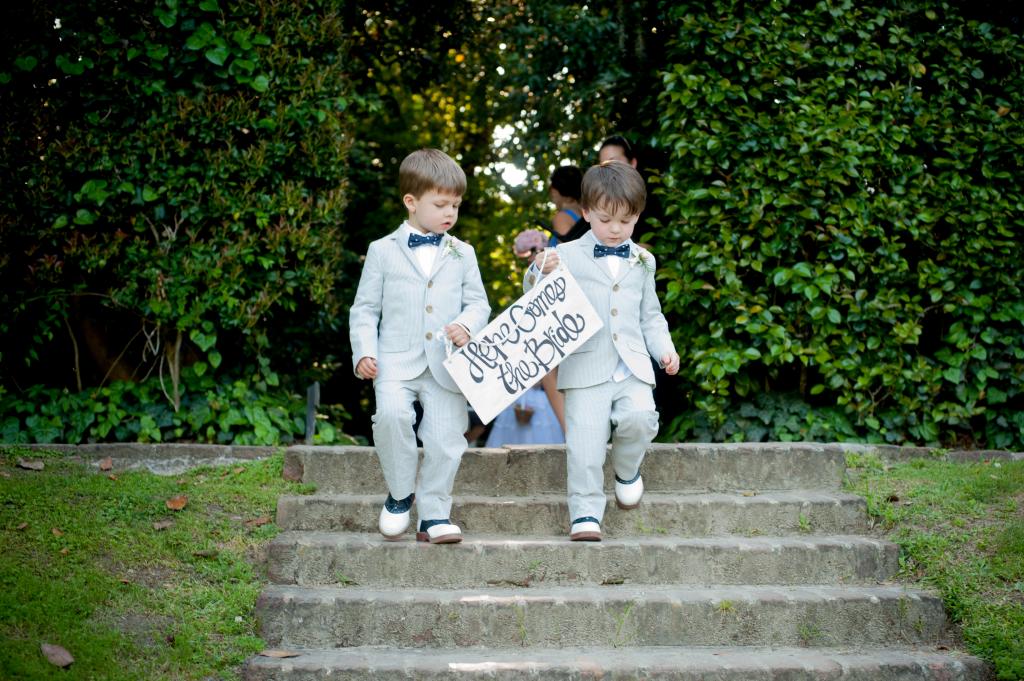 PRECIOUS PAIR: Suited up in seersucker and bow ties, ring bearers Keenan Ward (left) and Liam Green introduce their aunt D&#039;Anne.