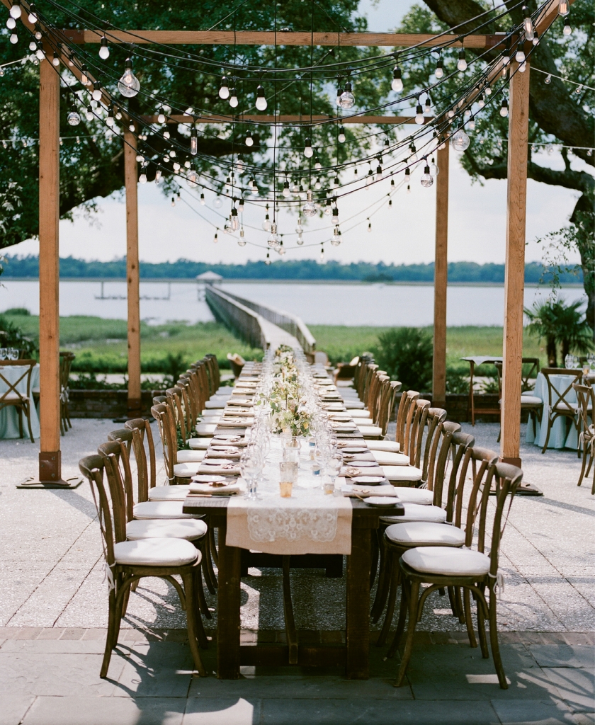 Photograph by Hyer Images at Lowndes Grove Plantation. Design by Loluma. Rentals by Snyder Event Rentals. Lighting by Technical Event Company.