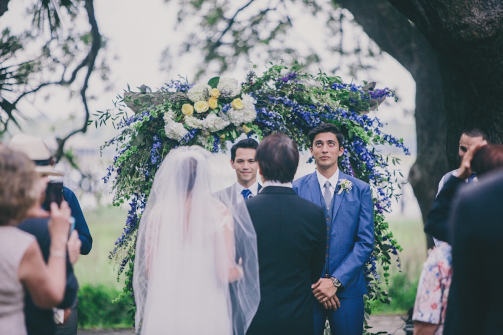 Photograph by Hyer Images at Lowndes Grove Plantation. Floral arch by Loluma.