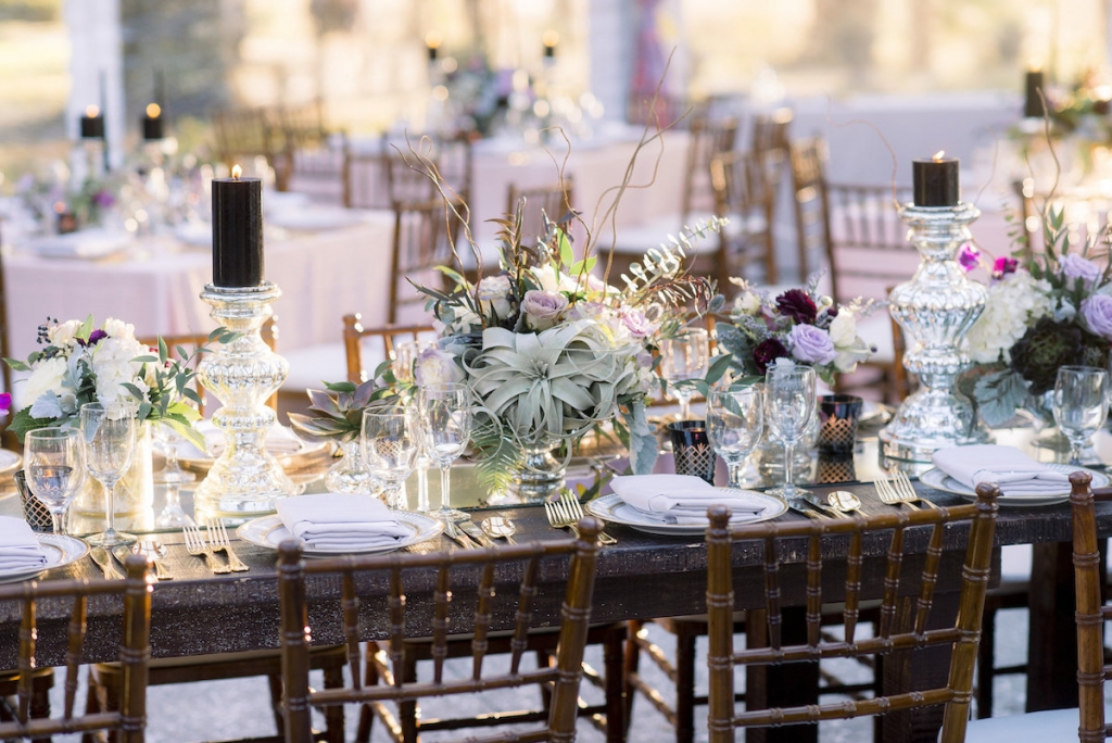 Wedding design by A Charleston Bride. Tables, chairs, china and stemware from Snyder Events. Linens from BBJ Linens. Florals by Stems Floral Design by Jonie Larosee. Image by Timwill Photography.
