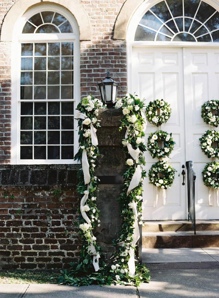 Florals by Blossoms Events. Photograph by Tec Petaja at Prince George Winyah Episcopal Church.