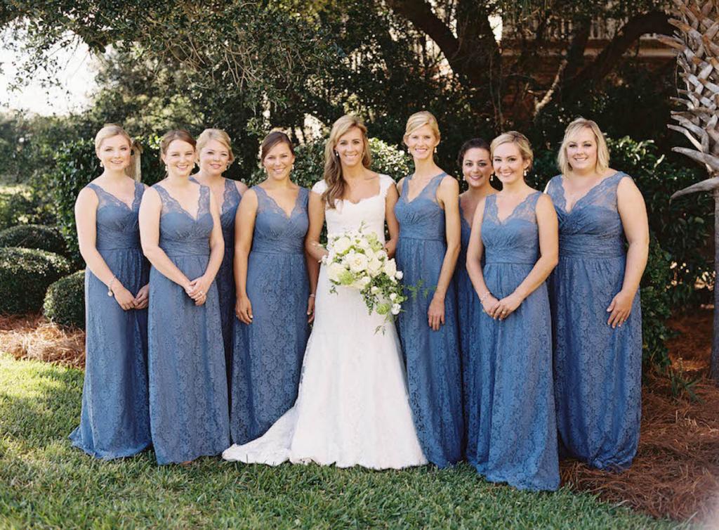 Bridesmaid dresses echoed the blue hue of the Scotch plaid seen throughout the décor. Bride&#039;s gown by Monique Lhuillier (available locally at Maddison Row). Bridesmaids&#039; dresses by Amsale (available locally at Bella Bridesmaids). Hair by Stuart Laurence Salon. Makeup by Kelly Martuscello. Florals by Blossoms Events. Photograph by Tec Petaja.