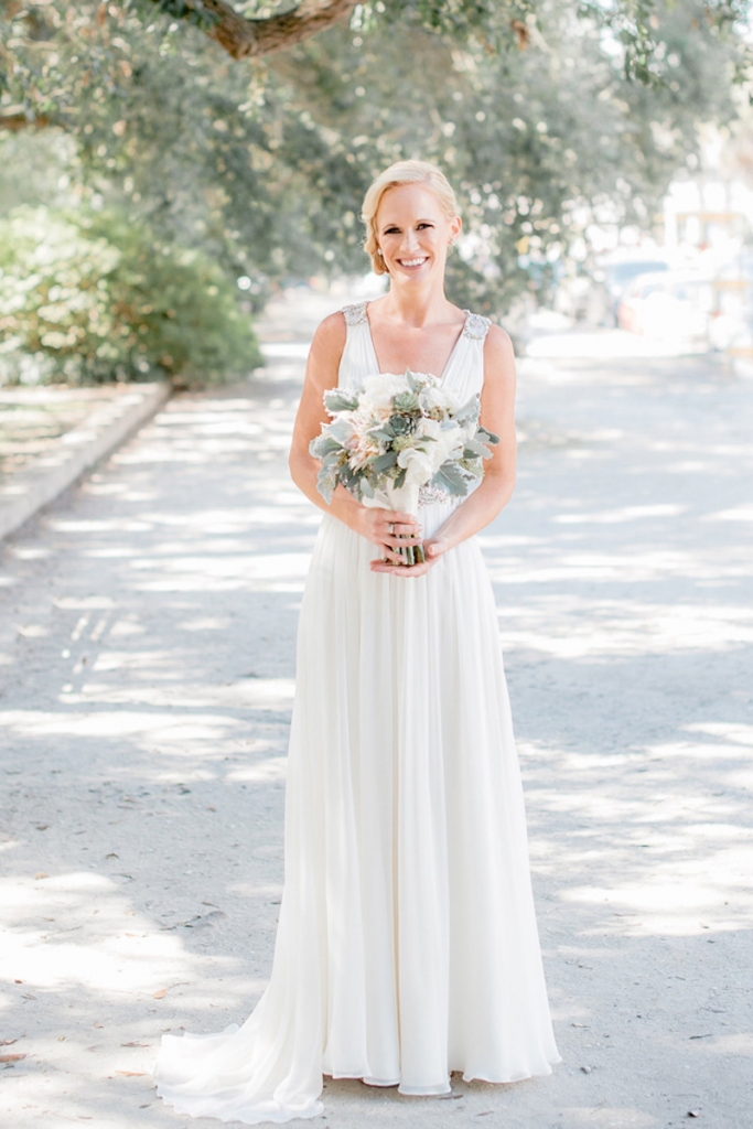 Bride’s gown by Jenny Packham (available locally through White on Daniel Island). Beauty by Wedding Hair by Charlotte. Bouquet by Out of the Garden. Image by Brandon Lata Photography at Boone Hall Plantation and Cotton Dock.
