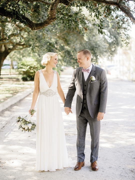 Bride’s gown by Jenny Packham (available locally through White on Daniel Island). Beauty by Wedding Hair by Charlotte. Menswear by Bonobos. Bow ties by High Cotton. Bouquet by Out of the Garden. Image by Brandon Lata Photography at Boone Hall Plantation and Cotton Dock.
