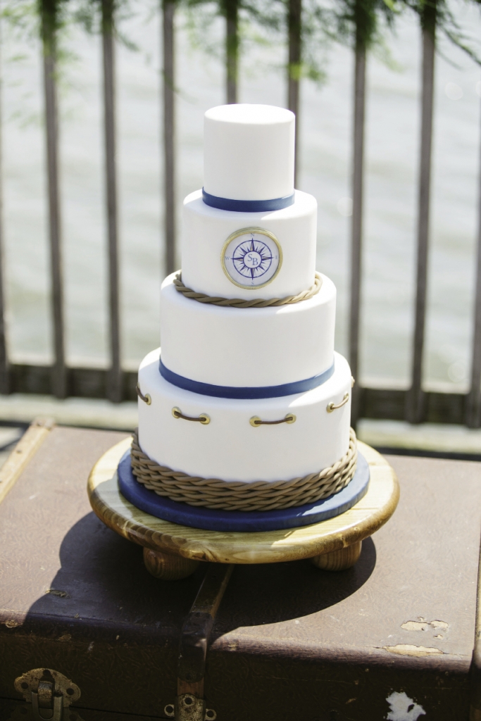 SEA STAR: Delicious Desserts turned sugar paper and fondant into decorative compass and rope details.