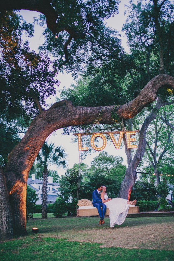Photograph by Hyer Images at Lowndes Grove Plantation. Love sign by Loluma. Swing by Ooh! Events.