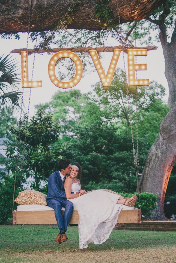 Photograph by Hyer Images at Lowndes Grove Plantation. Love sign by Loluma. Swing by Ooh! Events.