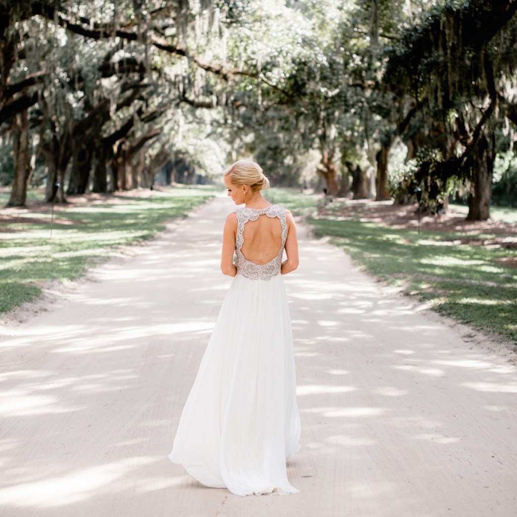 Bride’s gown by Jenny Packham (available locally through White on Daniel Island). Beauty by Wedding Hair by Charlotte. Image by Brandon Lata Photography at Boone Hall Plantation and Cotton Dock.