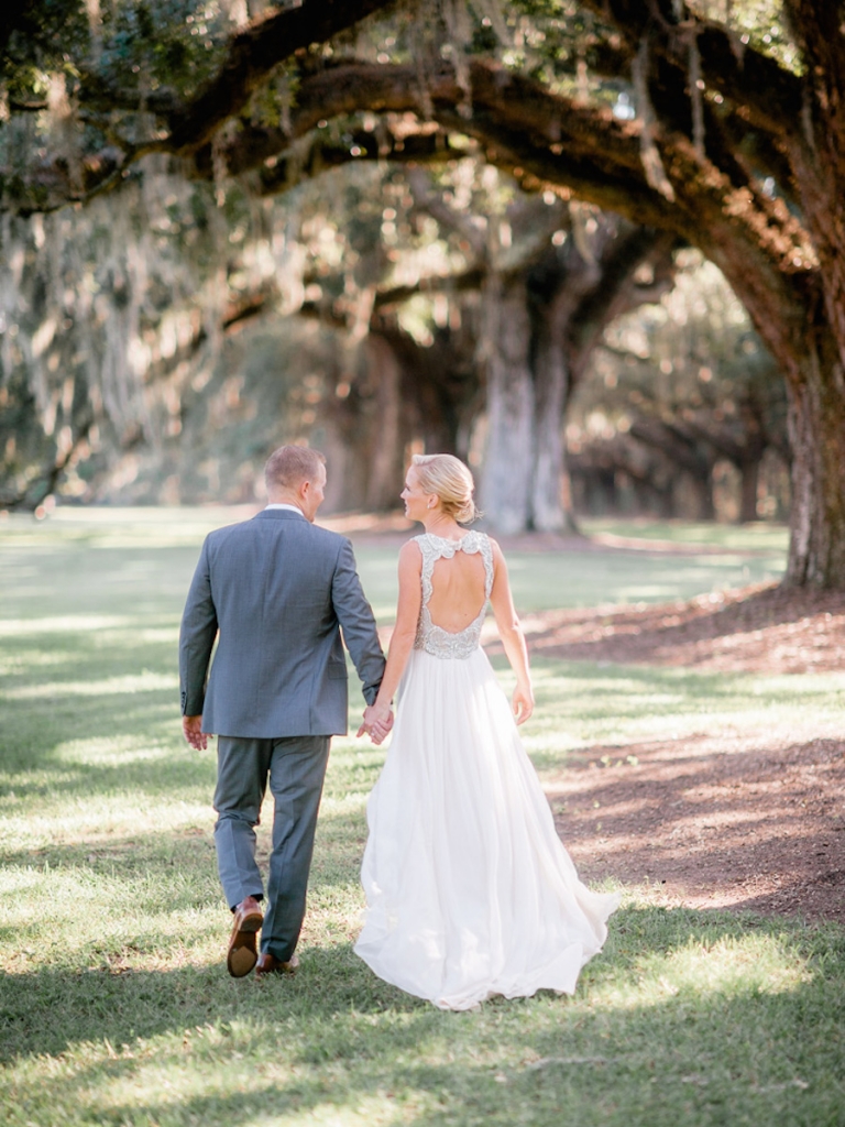 Bride’s gown by Jenny Packham (available locally through White on Daniel Island). Menswear by Bonobos. Image by Brandon Lata Photography at Boone Hall Plantation and Cotton Dock.