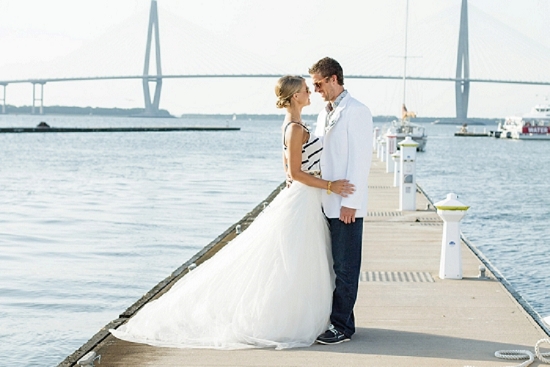 Bride’s skirt through Gown Boutique of Charleston. Bride’s top through Target. Groom’s jacket through Charleston Tuxedo. Styling by Alden DeHart of Scarlet Styles. Shoot design by Scarlet Plan &amp; Design. Image by The Click Chick Photography at Charleston Harbor Resort &amp; Marina.