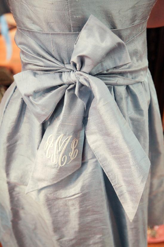 PERSONAL TOUCH: Each attendant’s initials were embroidered in the sash of their LulaKate frocks.