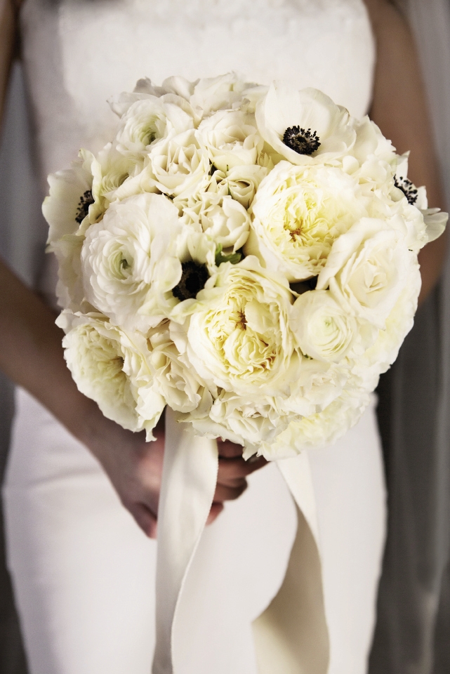 WHITE OUT: Jessica’s bridal bouquet by Tara Guérard Soirée featured pristine white peonies, roses, and anemones.