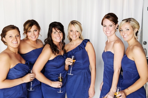 TRUE BLUE: Bridesmaids sported cheery blue LulaKate frocks.