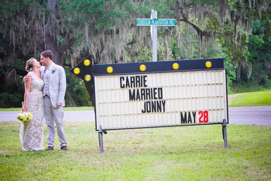 OPENING SHOW: Carrie and Jonny rented an old movie sign to direct guests to the wedding and played off of the name of their wedding website: CarrieMarriesJonny.com.