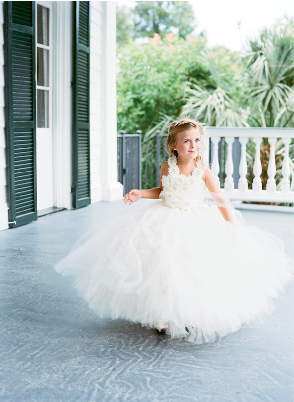 “Afton, my husband’s niece, wanted to be a ‘pretty princess’ on the wedding day, so heavy tulle was the way to go,” Ali says.  &lt;i&gt;Photograph by Gayle Brooker&lt;/i&gt;