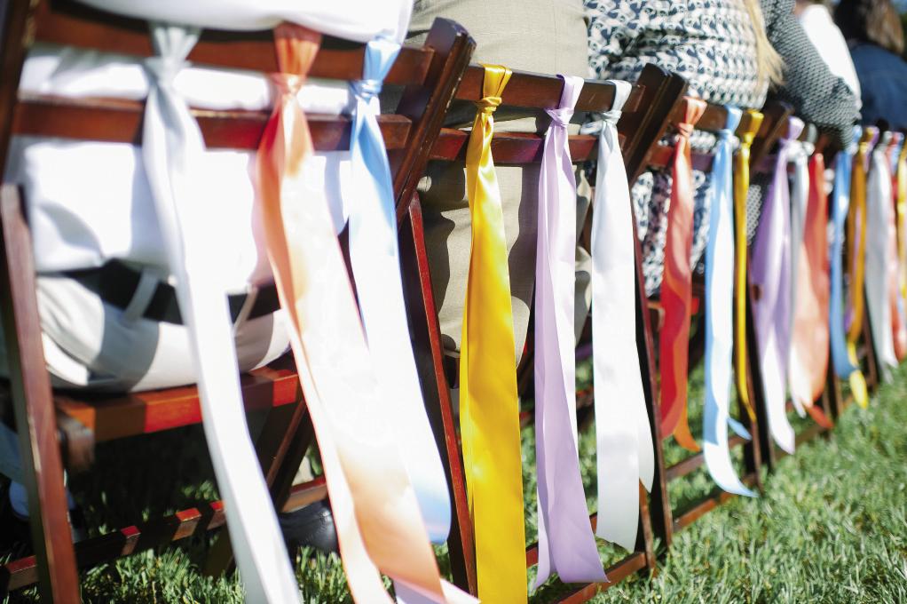 SOFT TOUCH: Multi-colored ribbons added a cheery feel to classic wooden chairs.
