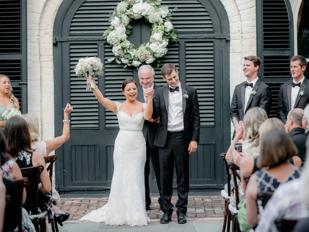 Wedding design by Ooh! Events. Bride&#039;s gown by Romona Keveza, available in Charleston through Maddison Row. Groom&#039;s attire from The Black Tux. Photograph by Brandon Lata at the William Aiken House.