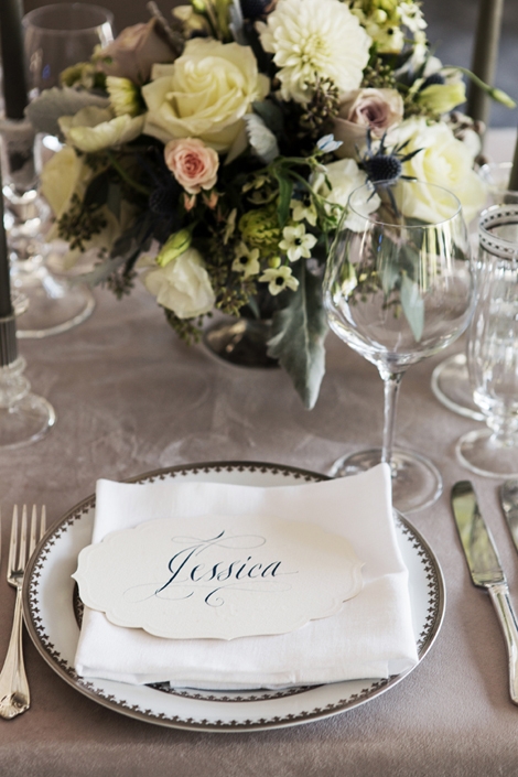 SILVER PLATE: China rimmed in platinum and navy further dressed the night in the wedding&#039;s colors.