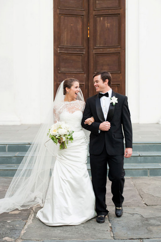Bridal attire by Monique Lhuillier, available in Charleston through Maddison Row. Groom’s attire by Jack Victor, available in Charleston through Berlin’s for Men. Florals by Sara York Grimshaw Designs. Image by Marni Rothschild Pictures at Second Presbyterian Church of Charleston.