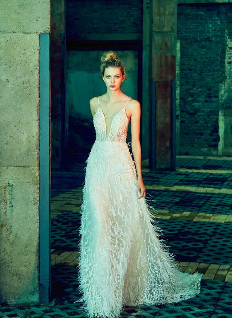 Fanciful Feathers - Gown: “Ava” by Calla Blanche  Boutique: Available locally through  Verità. A Bridal Boutique