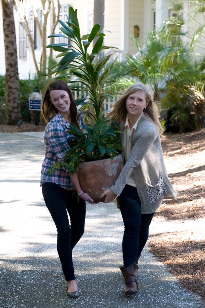 To get the opening shot for the story, we had to swap out some wintery looking planters for some evergreen ones. With the buff Daisy Bainum (Charleston Weddings intern) and Molly, the swap-out was a snap. Photograph by Taylor Horton