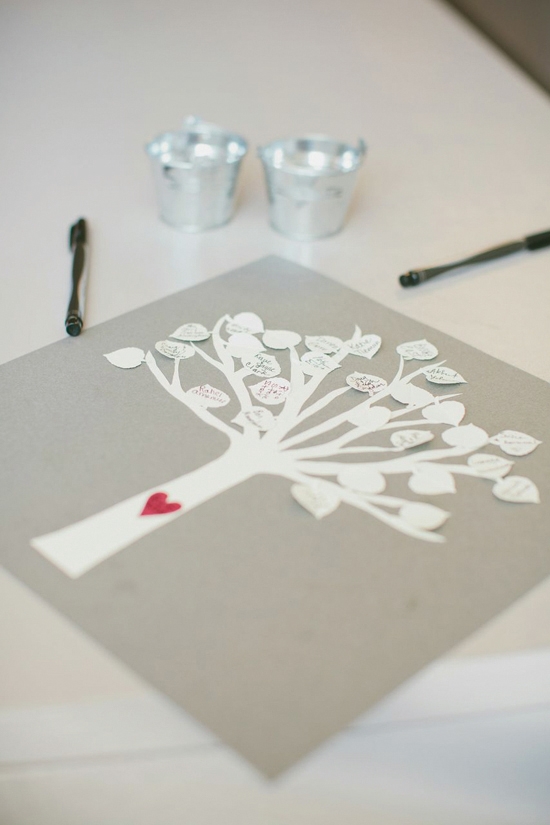 LEAVES OF LOVE: A simple tree print added a sentimental and artistic touch for the guest book.