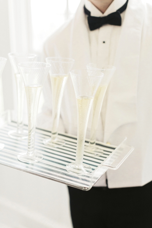 TRAY CHIC: Guests were greeted by champagne served on platters sporting the classic nautical pattern: stripes.