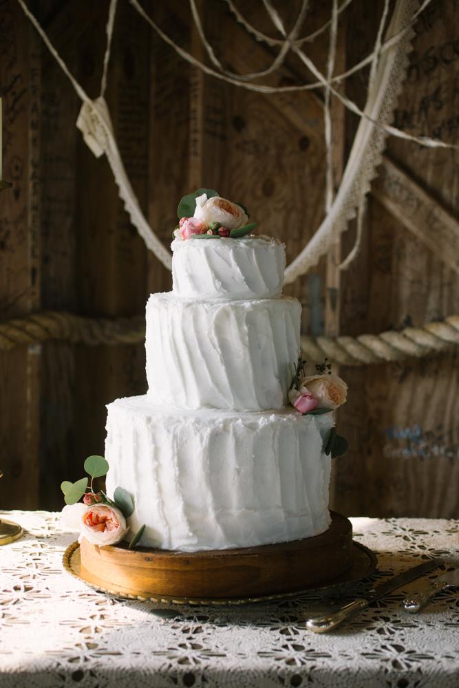 Cake by bride’s mother. Wedding design by bride. Image by Susan Dean Photography at Bowens Island Restaurant.