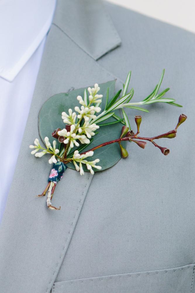 Boutonnière by bride and friends. Image by Susan Dean Photography.