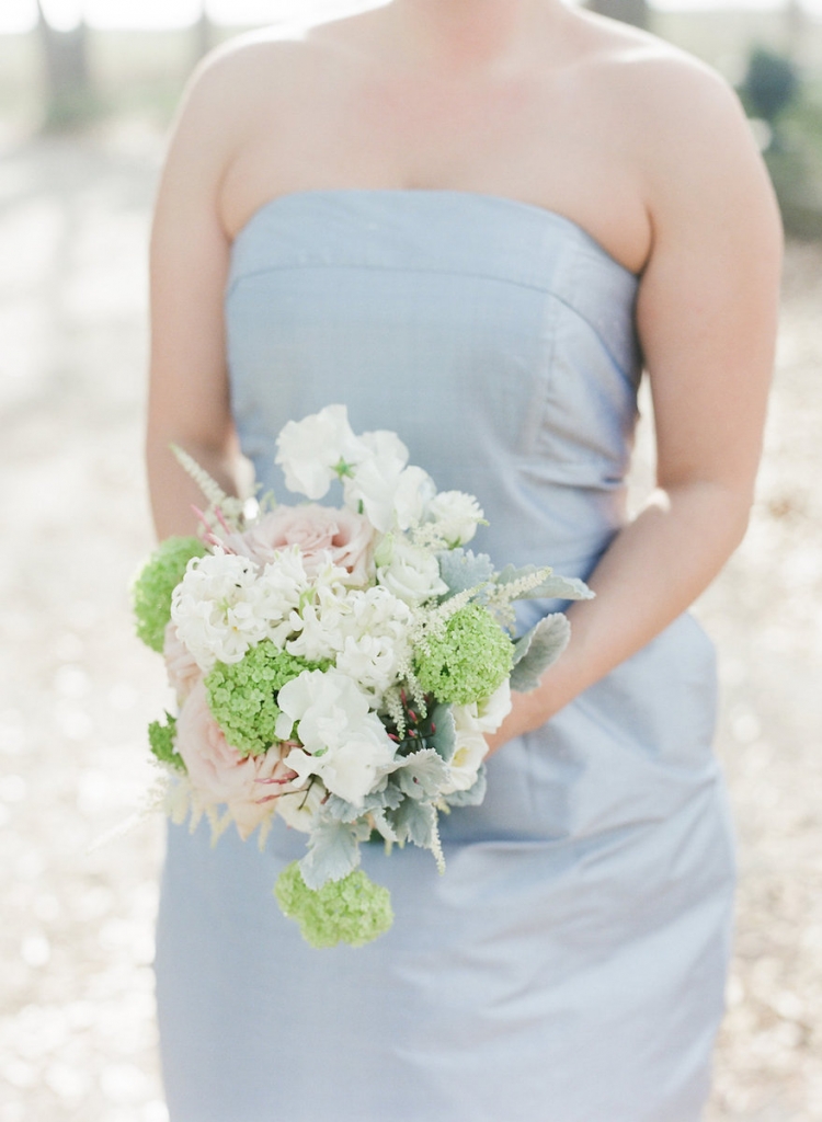 Photograph by Corbin Gurkin. Bridesmaid&#039;s attire by LulaKate. Bouquet by Blossoms Events.