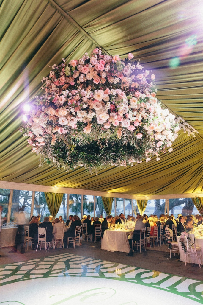 Photograph by Corbin Gurkin. Design by Easton Events. Draping and florals by Blossoms Events. Lighting by Technical Event Company.