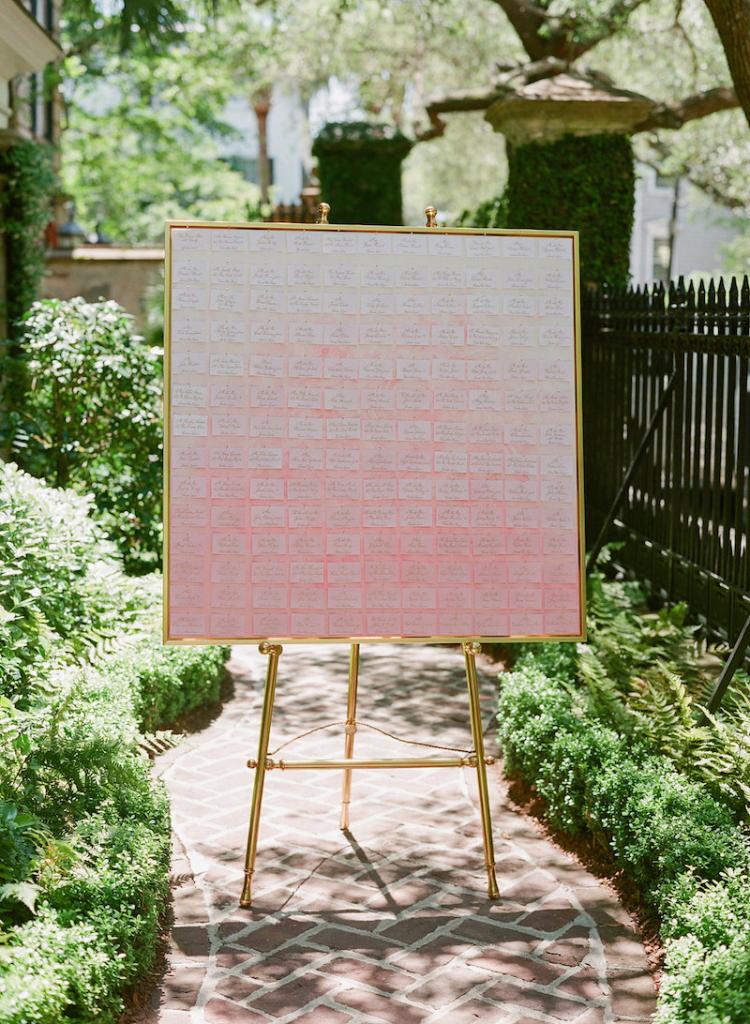 Wedding design by Kristin Newman Designs. Escort card display by Natalie Taylor Humphrey. Photograph by Corbin Gurkin at a private home South of Broad.