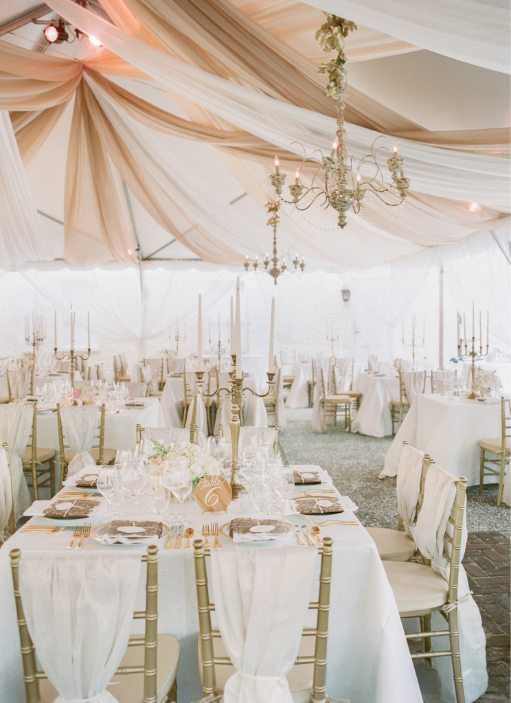 Photograph by Corbin Gurkin. Tent and rentals by Snyder Event Rentals. Design by Tara Guerard Soiree. Lighting by Production Design Associates.