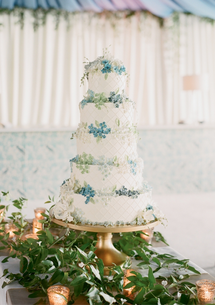 Cake maestro Jim Smeal works almost exclusively in buttercream, but he handmade  hundreds of sugar-paste flowers for Laura and Skip’s stunning treat. (Photo by Corbin Gurkin)