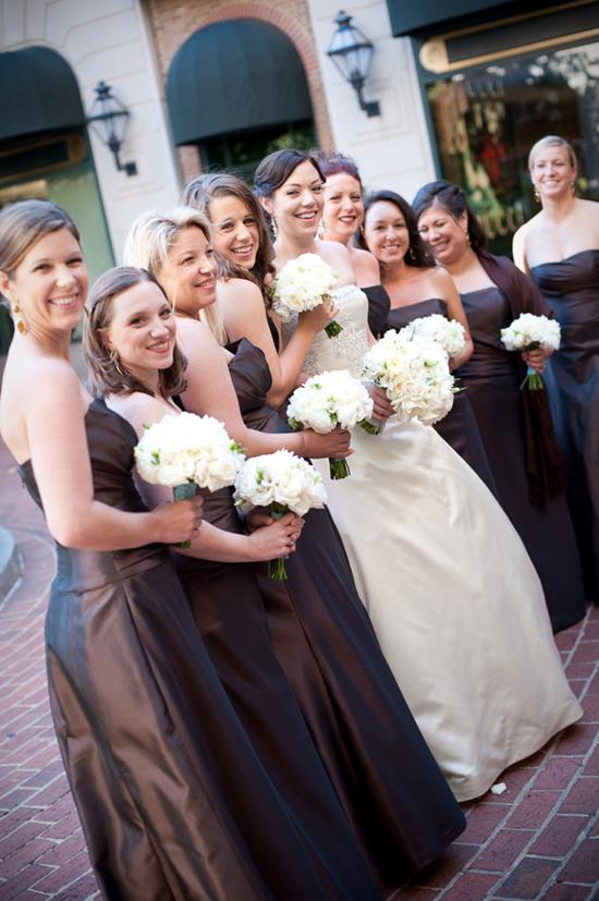 FANCY FRIENDS: The bridesmaids’ floor-length Amsale gowns synced with both the color and vibe of the formal affair.