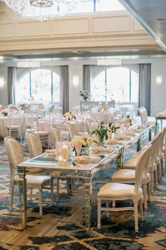 Mirrored tables, blush glassware, and bright silver perfectly suited the soft luxury of Hotel Bennett.