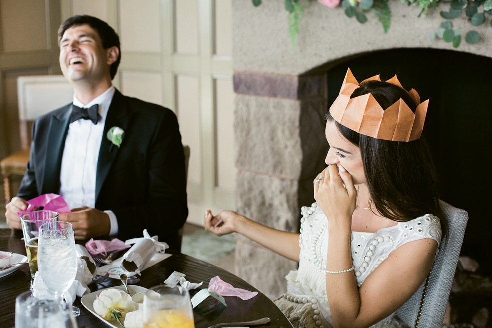 Brooke’s mom carried on her party tradition of sharing paper crowns and poppers, and customized the latter with rhyming riddles about the newlyweds.