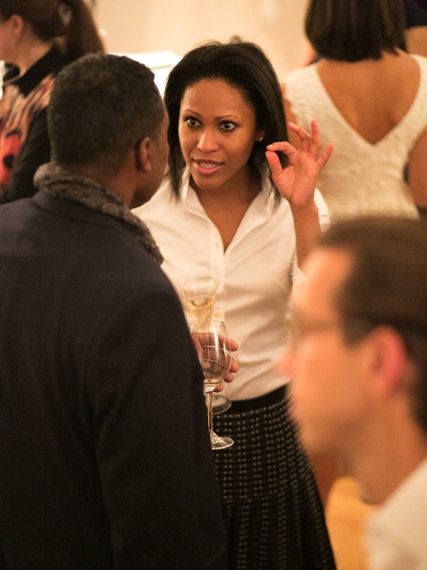 Mark Ingram and Indira RIvera, sales manager at his atelier, catch up over cocktails.