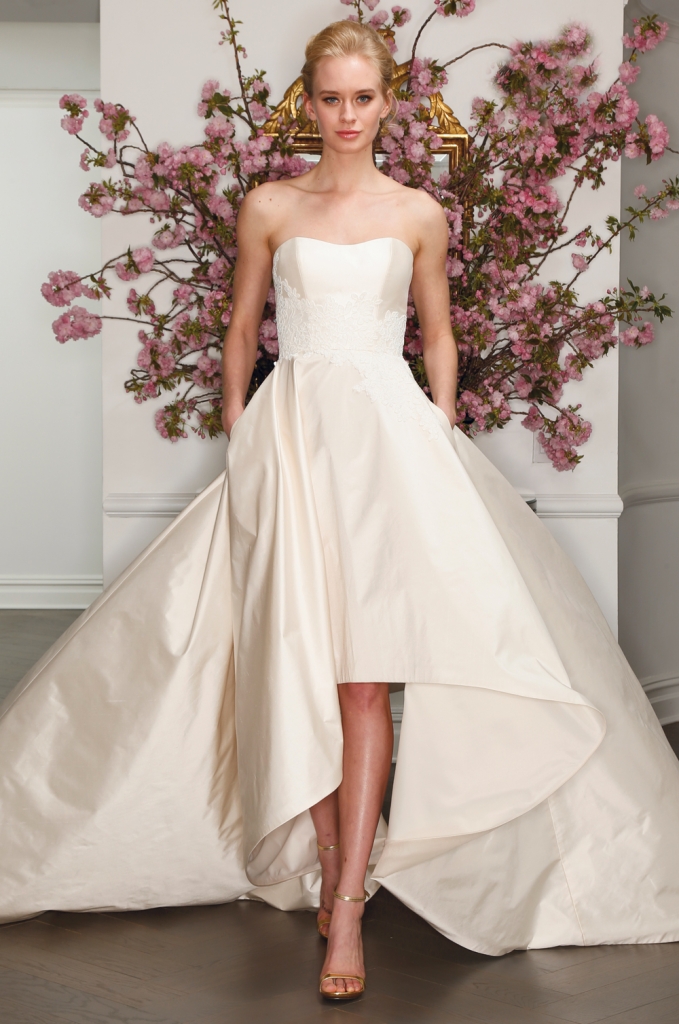 TREND: Taffeta with lace appliqué (Look close! It&#039;s on the bodice. And bonus: high-low and pockets done impeccably.)  GOWN: Legends by Romona Keveza’s L7130, available in Charleston through Maddison Row