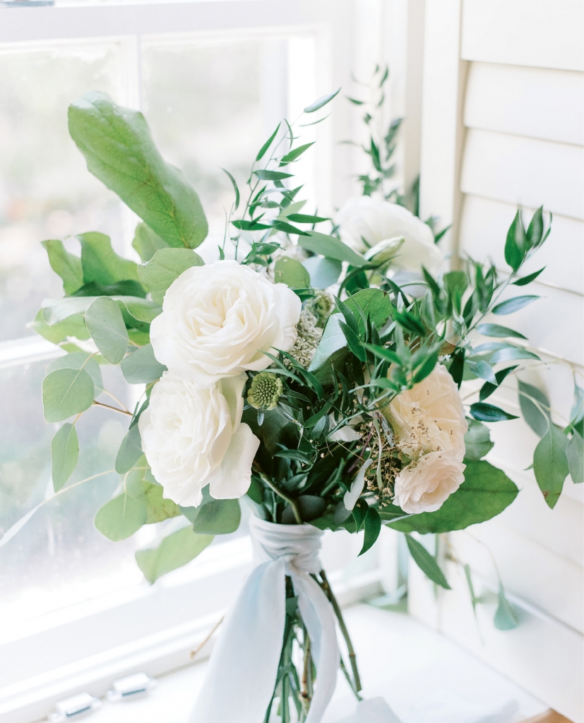 Jess and Patrick planned their elopement with thoughtful detail and timeless style. Miele Events worked with an all-white palette accented by lush greenery for a loose, organic look. (Photo by Aaron &amp; Jillian Photography)