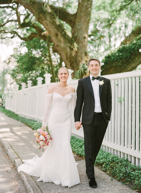 Having worked in the New York City fashion industry for 10 years, Hillary Hall shopped Monique Lhuillier’s showroom to find her fit-and-flare gown and after-party dress. Her groom, Hunter Gay, wore a tux from Canali and a Brackish bowtie.