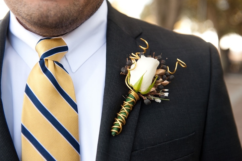 Boutonniere by WildFlowers, Inc. Suit from Men’s Warehouse. Image by Reese Moore Weddings.