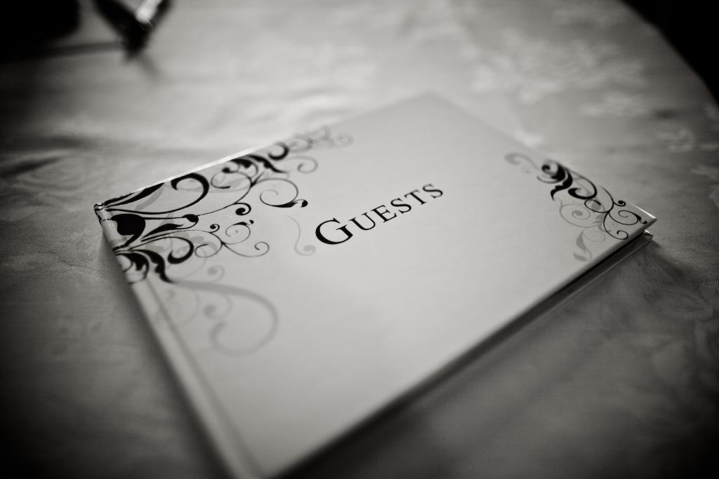 BE OUR GUEST: Fitting for the traditional tone of the evening, the guestbook was simple and classic.