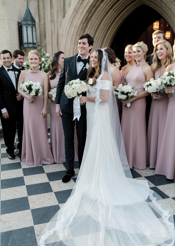 Mauve bridesmaids dresses were the day’s one concession to color.