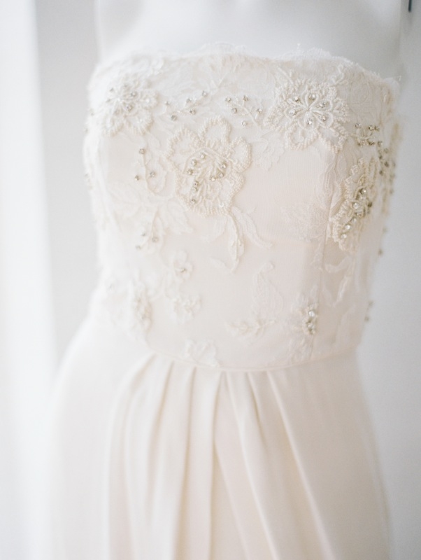 The tone-on-tone embellishments on this Kate McDonald gown add subtle elegance to a classic bodice.