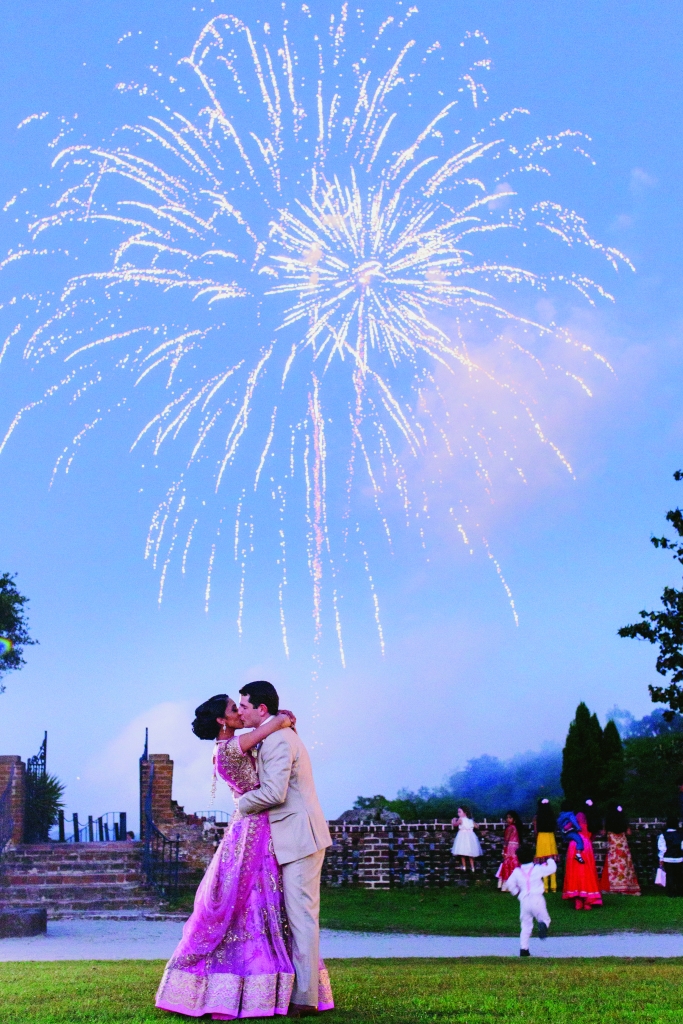 “I wanted a fireworks display to  give us a chance to pause and take it all in,” Manasa says. As a surprise, Luke arranged for a longer, more exciting display than they’d discussed. “All the children running and screaming in pure joy made those minutes spectacular,” says the bride. &lt;i&gt;Photograph by Hyer Images&lt;/i&gt;