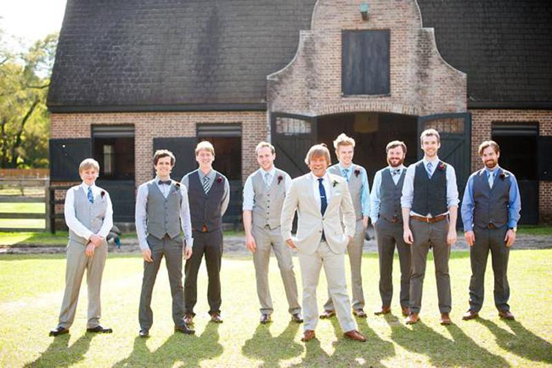 Groom’s attire from J.Crew (suit), Sid Mashburn (shirt), and Etsy (pocket square). Groomsmen attire from J.Crew. Image by Timwill Photography at Middleton Place.