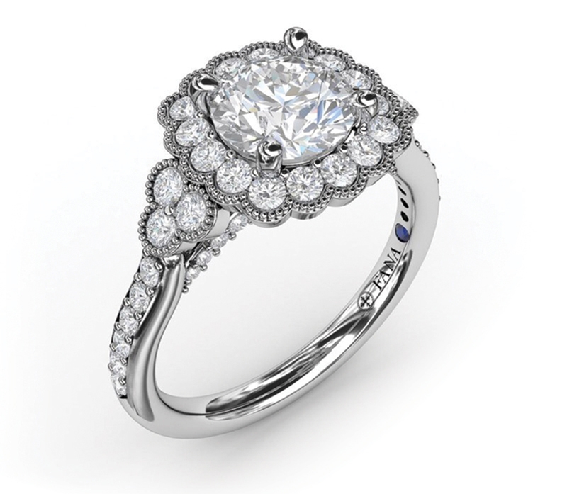 Fana floral halo ring with diamond accents (price upon request) from M.P. Demetre Jewelers