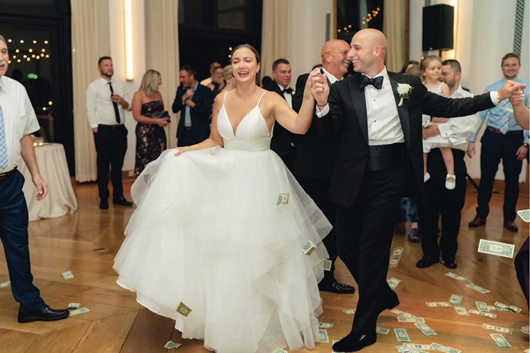 The bride and groom reveled in a Greek money dance at the reception.